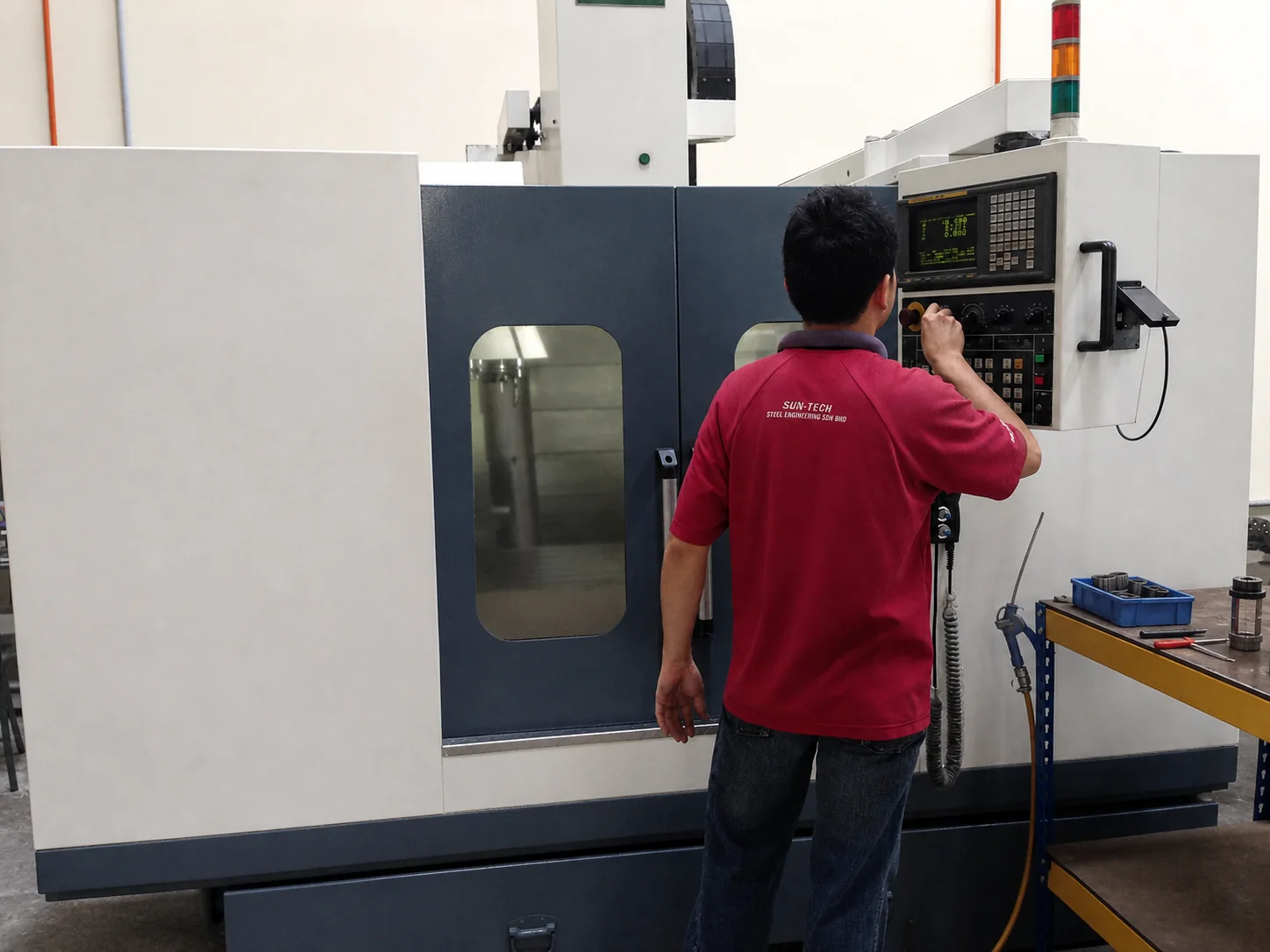 CNC machining center operation at Sun-Tech